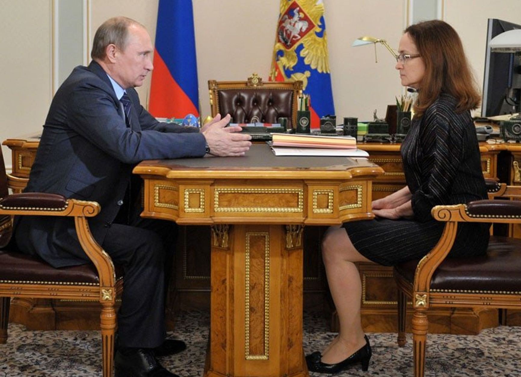 Vladimir Putin and Russian Central Bank Governor Elvira Nabiullina